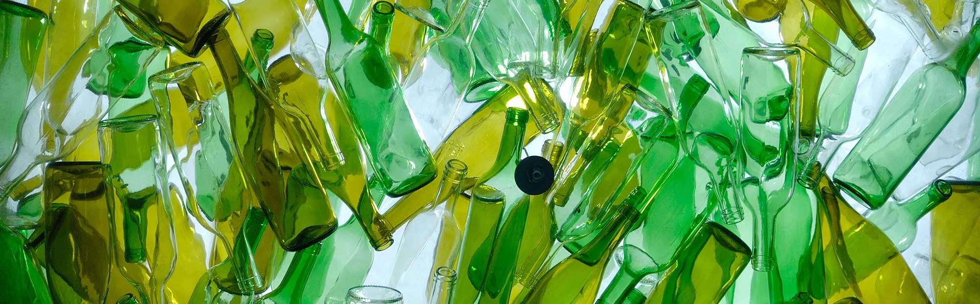 Collection of green and brown glass bottles